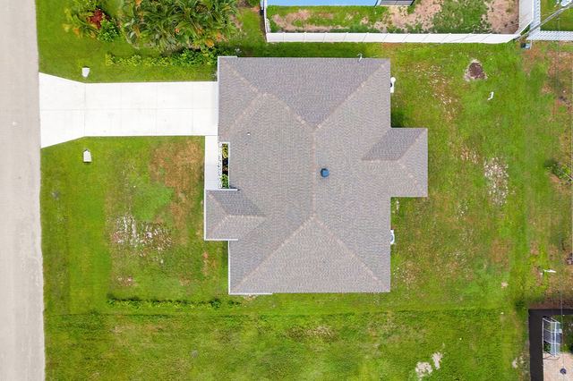 Aerial view of the home and yard from above