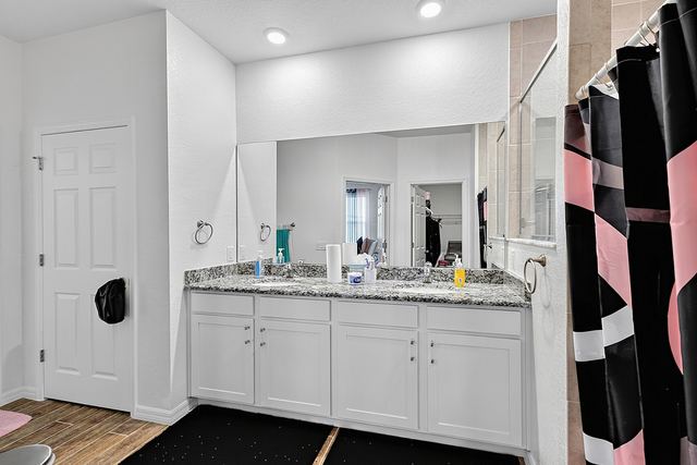 Primary bath with double granite vanity
