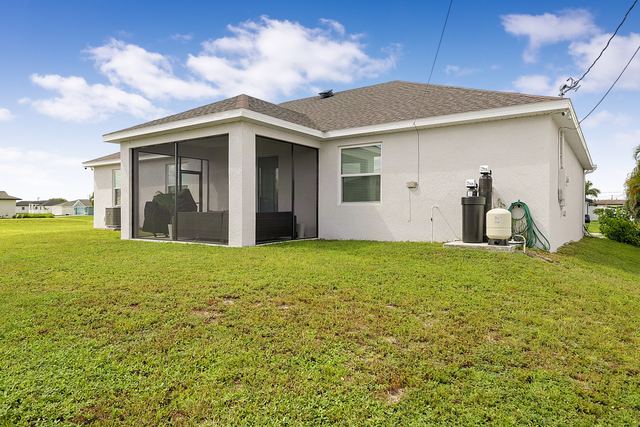 Rear exterior and back yard