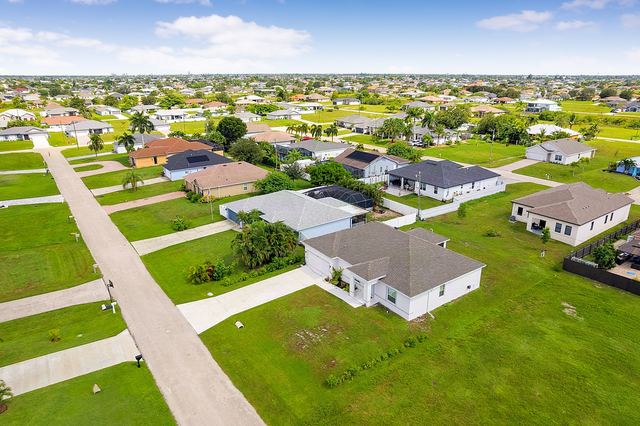 Aerial view of the street and neighborhood